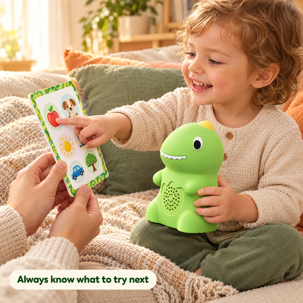 Toddler tapping a phonics card held by a parent